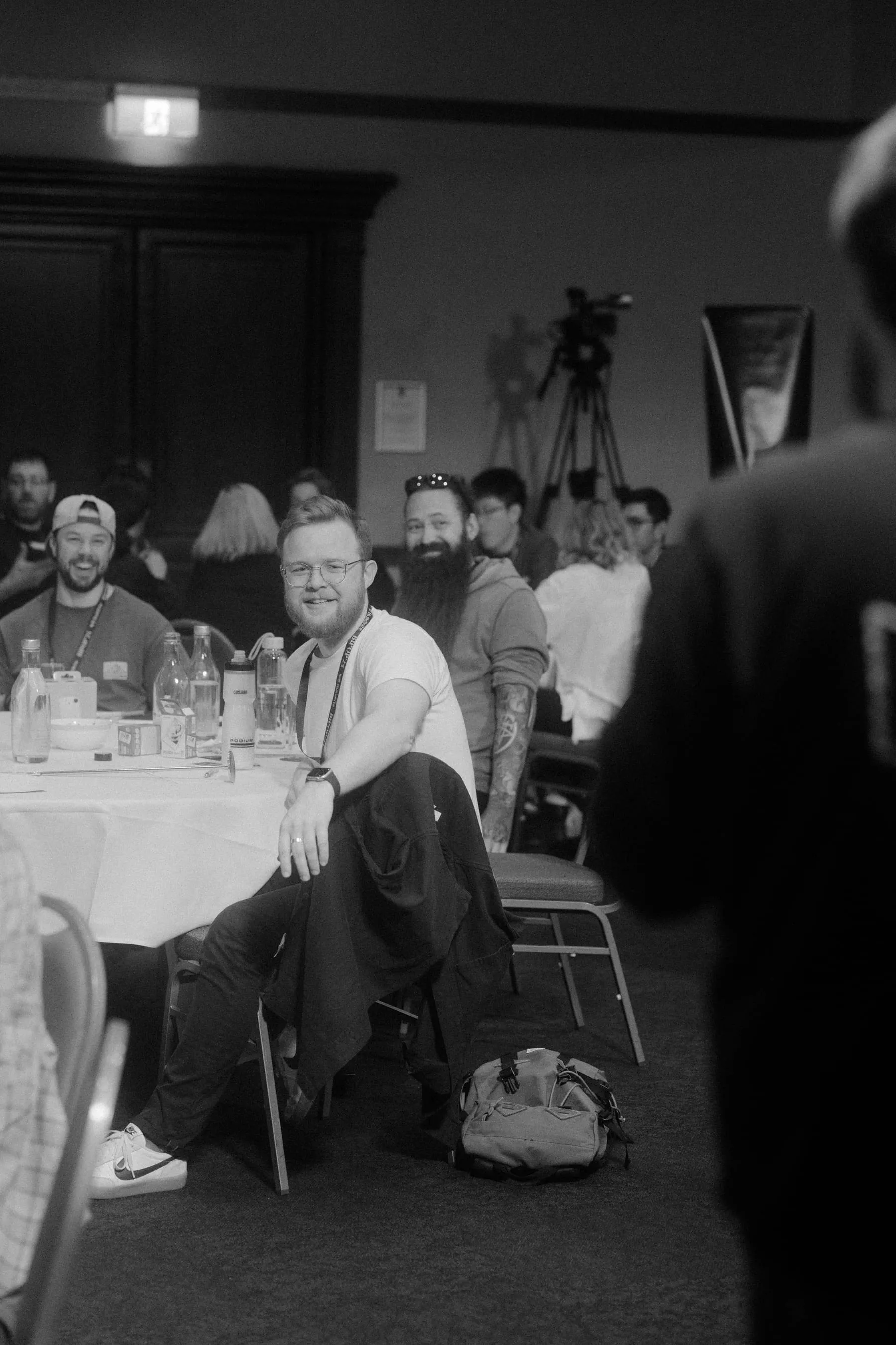 Buildkite team members gathered around a table